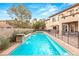 Stunning pool with water features, a spa, and a spacious patio area at 10412 Mansion Hills Ave, Las Vegas, NV 89144