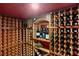 Private wine cellar with custom racks and space for extensive collection at 10412 Mansion Hills Ave, Las Vegas, NV 89144