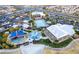Community aerial view showcasing the pool, playground, clubhouse, and surrounding neighborhood at 10604 Sariah Skye Ave, Las Vegas, NV 89166