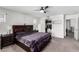 This primary bedroom boasts neutral colors, carpet floors, and a walk-in closet at 10604 Sariah Skye Ave, Las Vegas, NV 89166