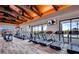 Modern gym with treadmills and elliptical machines, bathed in natural light, for a healthy lifestyle at 10604 Sariah Skye Ave, Las Vegas, NV 89166