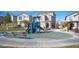 Community playground with modern equipment, benches, and well-maintained landscaping at 10604 Sariah Skye Ave, Las Vegas, NV 89166