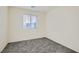 Neutral bedroom features carpet, one window, and neutral walls at 1163 Meadow Sparrow Pl, Henderson, NV 89011