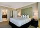 Bedroom featuring a queen-size bed and ensuite bathroom at 145 E Harmon Ave # 2021, Las Vegas, NV 89109