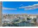 Expansive cityscape vista featuring skyline, mountains, and a green golf course at 145 E Harmon Ave # 2021, Las Vegas, NV 89109