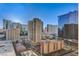 Elevated view of cityscape showcasing various buildings and neighborhood streets at 145 E Harmon Ave # 2021, Las Vegas, NV 89109