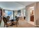 Living room with a dining table and chairs and views of the city at 145 E Harmon Ave # 2021, Las Vegas, NV 89109