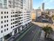 A multi-story building on a city street with greenery and shops at 150 Las Vegas Blvd # 2015, Las Vegas, NV 89101