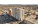 Aerial view of a modern high-rise condominium with a city backdrop and convenient parking garage at 150 Las Vegas Blvd # 2015, Las Vegas, NV 89101