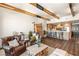 Bright and airy living space with modern ceiling beams flowing into a kitchen with seating, and comfortable seating at 150 Las Vegas Blvd # 2015, Las Vegas, NV 89101
