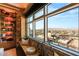 Inviting living room with custom bookshelves, exposed brick, and scenic city views at 150 Las Vegas Blvd # 2015, Las Vegas, NV 89101