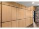 Modern storage unit with bright wood paneling and black trim, offering a sleek and organized look at 150 Las Vegas Blvd # 2015, Las Vegas, NV 89101