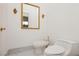 All white bathroom with bidet, toilet, and gold fixtures at 1704 Wincanton Dr, Las Vegas, NV 89134
