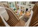 Open foyer featuring a grand staircase and views of the living and dining areas at 1704 Wincanton Dr, Las Vegas, NV 89134