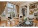 Elegant entryway with soaring ceilings, grand staircase, and beautiful front doors, making a great first impression at 1704 Wincanton Dr, Las Vegas, NV 89134