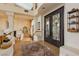Welcoming foyer features high ceilings and elegant finishes, setting a sophisticated tone for the home at 1704 Wincanton Dr, Las Vegas, NV 89134