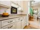 Traditional kitchen showcases granite counters and custom cabinets at 1704 Wincanton Dr, Las Vegas, NV 89134