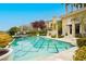 Inviting pool and spa area with lush greenery, perfect for outdoor entertaining and relaxation at 1704 Wincanton Dr, Las Vegas, NV 89134