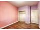 Bedroom with wood flooring and closet at 1809 Lazy Hill Ranch Way, North Las Vegas, NV 89081