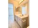 Bathroom featuring a vanity with cabinet storage and an attached mirror at 2064 Mesquite Ln # 303, Laughlin, NV 89029