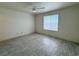 Bright bedroom featuring a ceiling fan and a large window at 2064 Mesquite Ln # 303, Laughlin, NV 89029