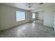 Sunny bedroom with ceiling fan, mirrored closet, and bright window at 2064 Mesquite Ln # 303, Laughlin, NV 89029