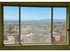 Clear view of the city and mountains from the open-plan living area's expansive window with view at 2064 Mesquite Ln # 303, Laughlin, NV 89029