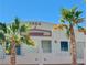 Close-up of the building's exterior featuring palm trees and a well-maintained facade at 2064 Mesquite Ln # 303, Laughlin, NV 89029