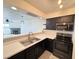 Open kitchen with stainless steel appliances and a view of the living room at 2064 Mesquite Ln # 303, Laughlin, NV 89029