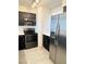 Modern kitchen with stainless steel appliances and sleek black cabinetry at 2064 Mesquite Ln # 303, Laughlin, NV 89029