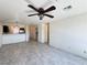 Spacious living room with kitchen in background and hallway entrance to rooms, light grey hardwood floors at 2064 Mesquite Ln # 303, Laughlin, NV 89029