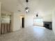 Spacious living room features tile floors, fireplace, large windows with nice views, and modern light fixtures at 2064 Mesquite Ln # 303, Laughlin, NV 89029