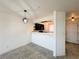 Open-concept living area featuring a view of the kitchen and front door at 2064 Mesquite Ln # 303, Laughlin, NV 89029