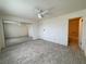 Generous bedroom offers a view of attached bathroom and mirrored closet at 2064 Mesquite Ln # 303, Laughlin, NV 89029