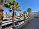 View from balcony overlooking parking area with palm trees at 2064 Mesquite Ln # 303, Laughlin, NV 89029