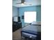A light and airy bedroom with a ceiling fan, window and nice furnishings at 2679 Lochleven Way, Henderson, NV 89044