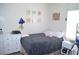 Cozy bedroom with dresser, nightstand, and comfortable furnishings at 2679 Lochleven Way, Henderson, NV 89044