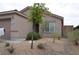 Charming single-story home featuring desert landscaping, neutral stucco, and an attached two-car garage at 2679 Lochleven Way, Henderson, NV 89044