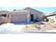 Charming single-story home featuring a two-car garage and low-maintenance desert landscaping at 2679 Lochleven Way, Henderson, NV 89044