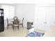 Bright kitchen with black appliances, wood cabinets, and breakfast nook at 2679 Lochleven Way, Henderson, NV 89044
