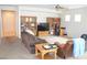 Spacious living room features a ceiling fan and well-placed furniture at 2679 Lochleven Way, Henderson, NV 89044