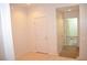 A room with a door to an adjacent area featuring a pet gate at 2679 Lochleven Way, Henderson, NV 89044