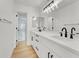 Modern bathroom with double vanity, sleek black hardware, and elegant light fixtures at 2725 S Nellis Blvd # 1033, Las Vegas, NV 89121
