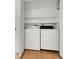 Efficient laundry closet featuring a stacked washer and dryer with shelving above at 2725 S Nellis Blvd # 1033, Las Vegas, NV 89121