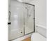 Clean white shower with sliding glass doors and updated fixtures at 2725 S Nellis Blvd # 1033, Las Vegas, NV 89121