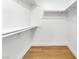 Bright walk-in closet with painted white walls, modern trim, and durable wood-look flooring at 2725 S Nellis Blvd # 1033, Las Vegas, NV 89121