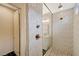 Modern bathroom featuring glass enclosed shower with stone floor and a single sink at 31 Castleton Tower Ct, Henderson, NV 89011
