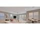 Open concept living area with a dining space and access to the backyard at 31 Castleton Tower Ct, Henderson, NV 89011