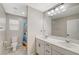 Clean bathroom features dual sinks with white countertops and ample lighting, toilet separate at 3164 Bormida Ave, Henderson, NV 89044