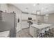 Spacious kitchen with a large center island, stainless steel appliances, and plenty of cabinet space at 3164 Bormida Ave, Henderson, NV 89044